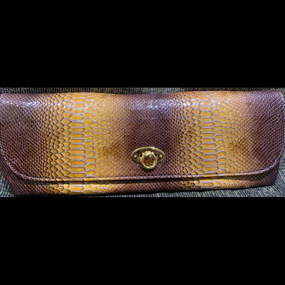 Beautiful snake skin print clutch by m. andonia los angeles